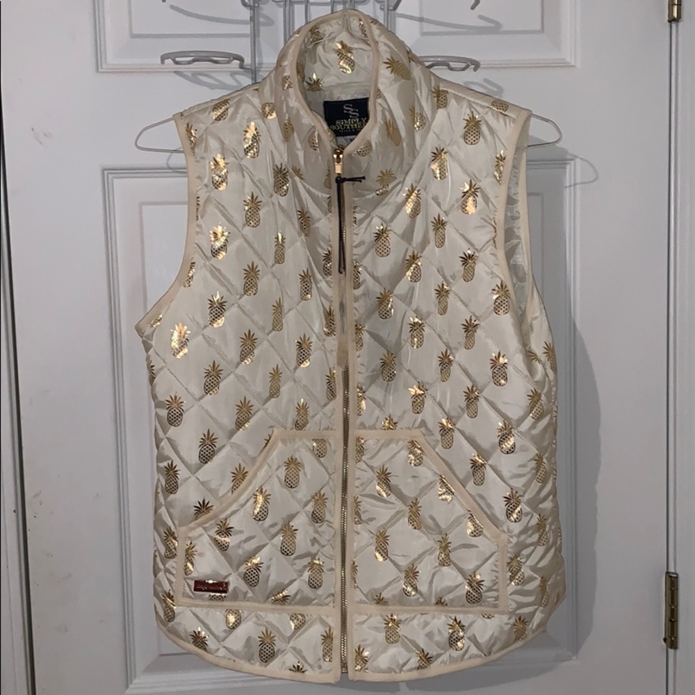 This ivory and gold vest really pops!